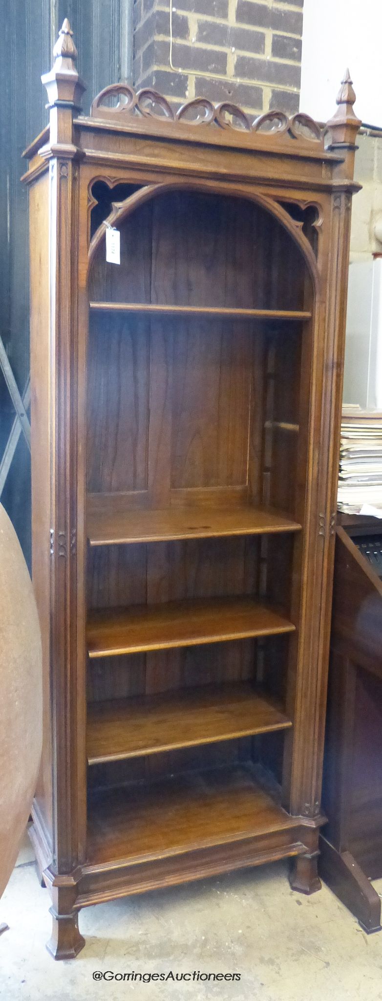 A Gothic revival oak open bookcase. W-76, D-39, H-215cm.